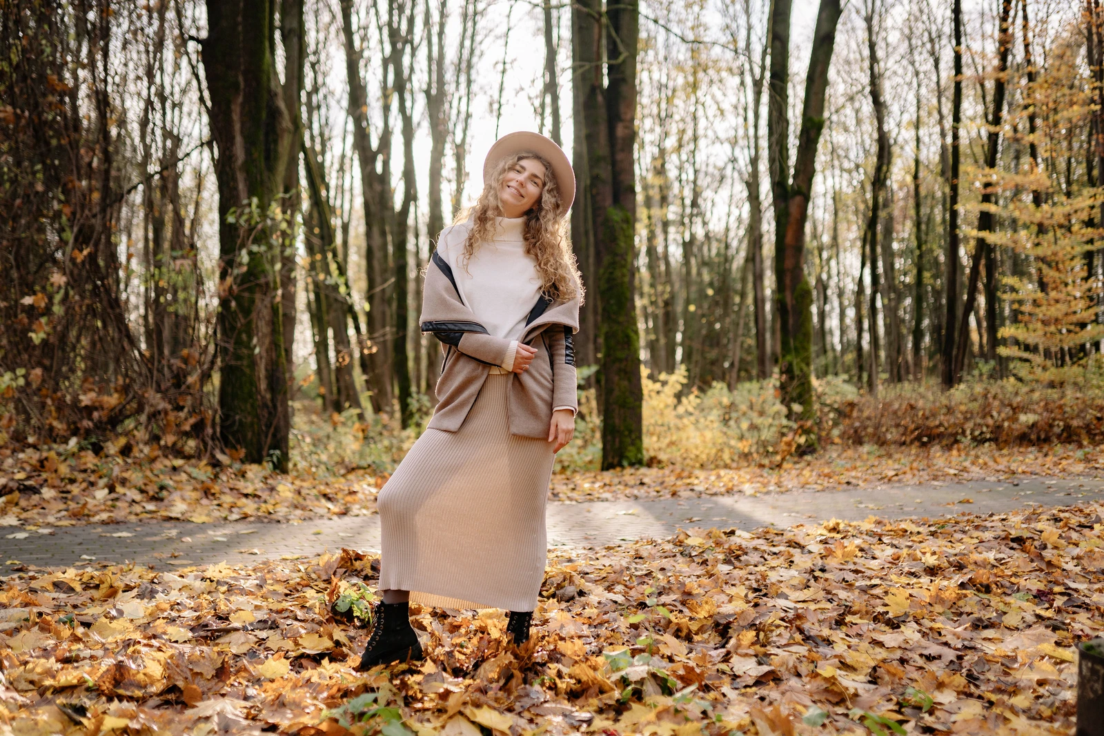 Cozy fall outfit, sweater and boots, autumn tones
